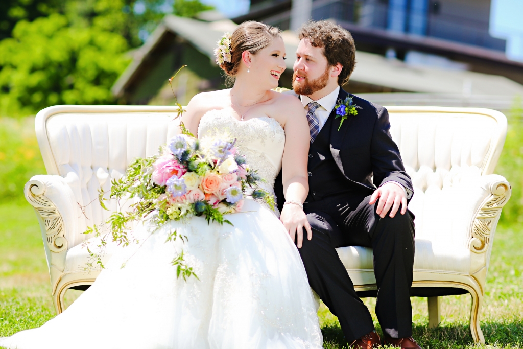 White Couch Photo Summer Bride and Groom