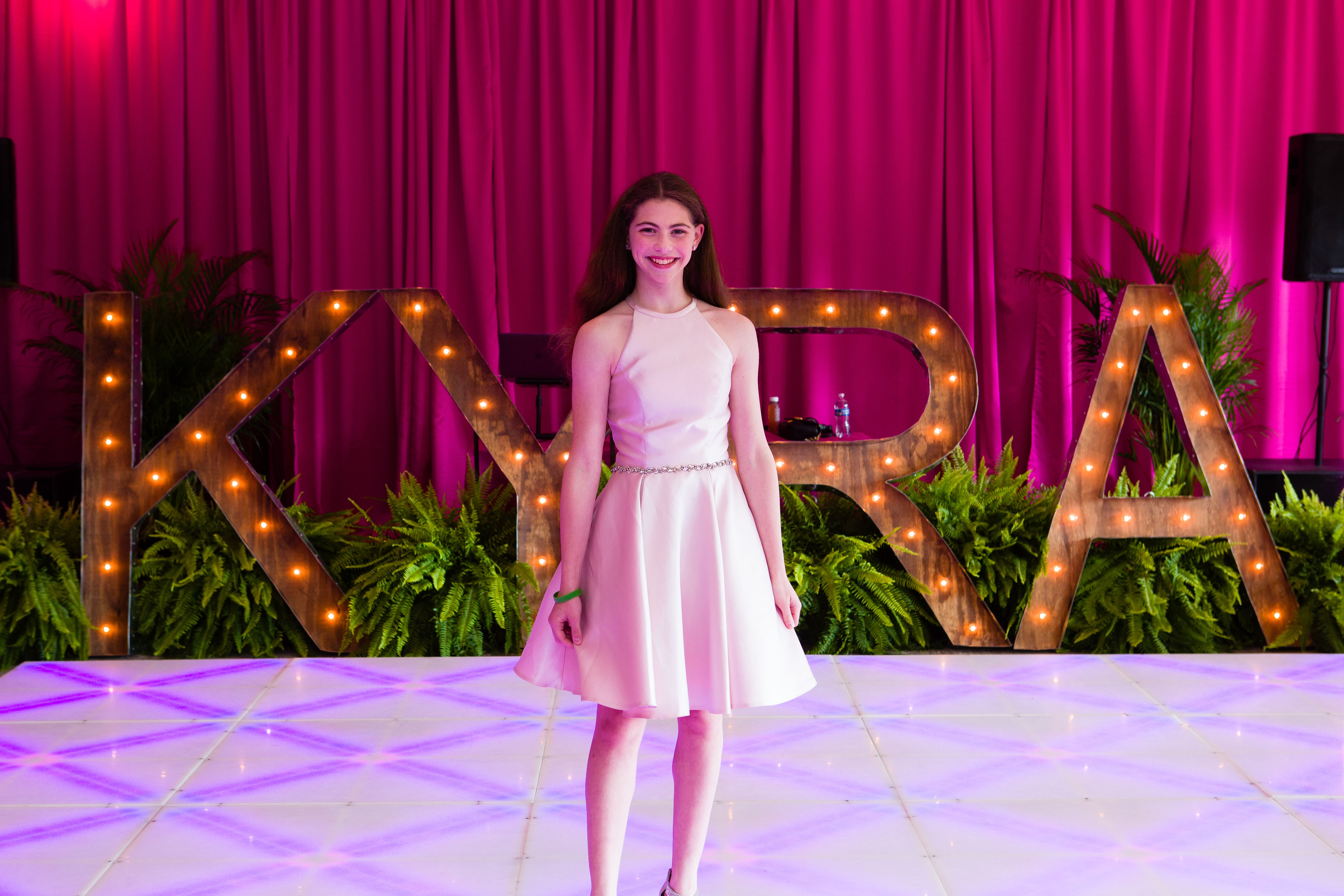 young girl in pink dress at her Indianapolis Bat Mitzvah