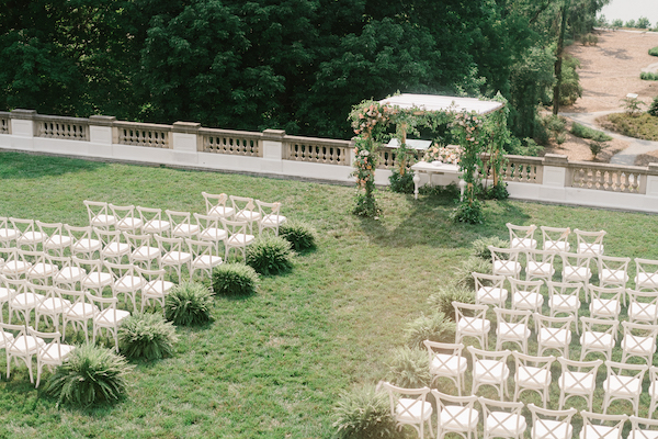 Luxurious Jewish wedding ceremony on the Lilly House Terrace at Newfields in Indianapolis
