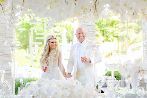 bride and groom at their luxurious Indianapolis white wedding