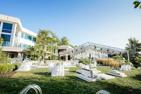 clear tent, lounge furniture, bars and decor at an elegant Indianapolis white wedding