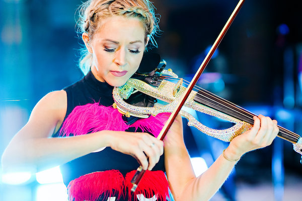 Lindsey Stirling performing at an Indianapolis luxury wedding