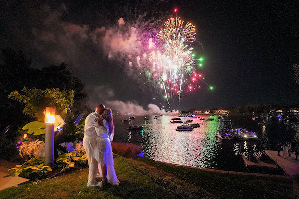 bride and groom enjoying a fireworks display at their Indianapolis luxury wedding