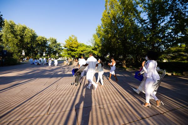 Guests heading to an undisclosed location for the 2021 Indianapolis Diner en Blanc