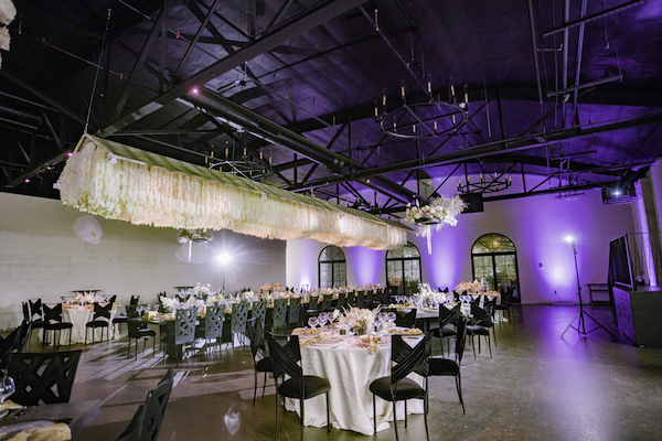 A Fantastic Ft Wayne wedding reception with a large hanging flora sculpture in the center of the room