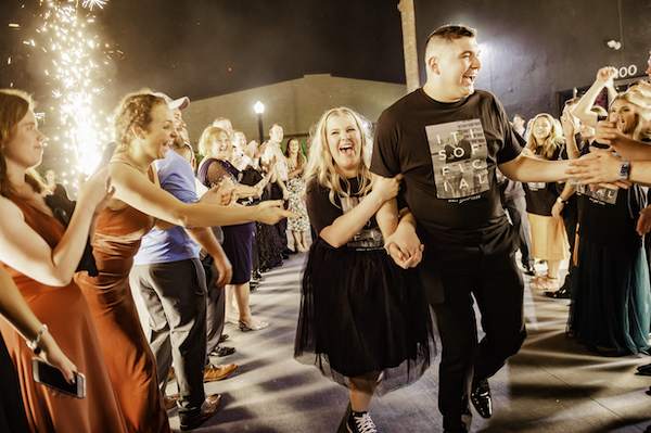 Happy bride and groom loving their fabulous Ft Wayne wedding in a shower of sparklers