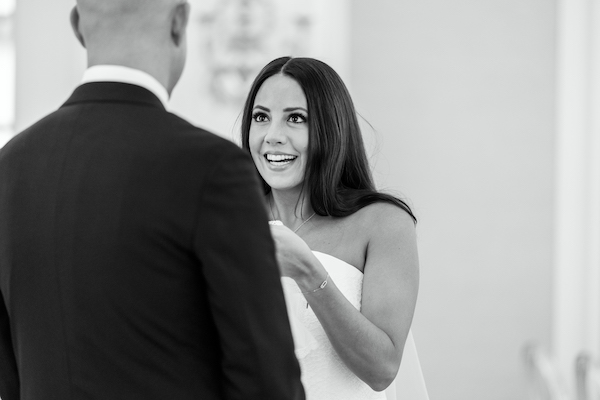 bride smiling at her groom after their first look