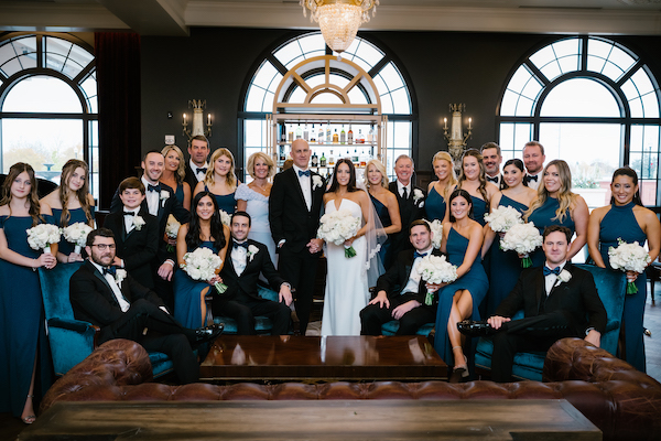wedding party portrait in the lobby of the Hotel Carmichael in Carmel 