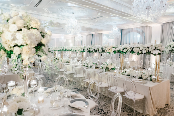 luxurious white wedding reception in the ballroom of the Hotel Carmichael in Carmel Indiana