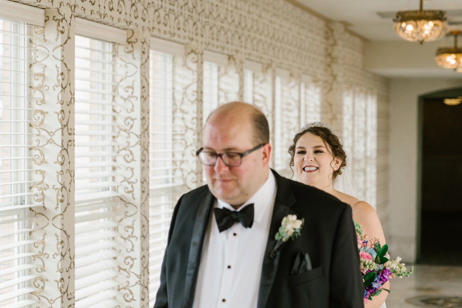 bride and groom's first look at the West Baden Springs Hotel