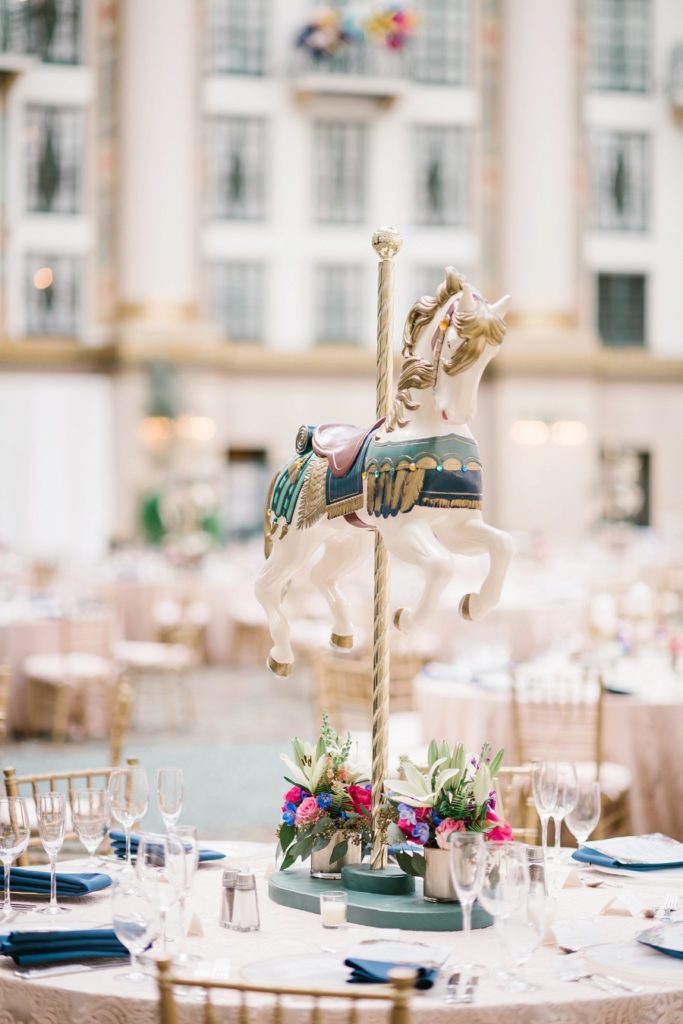carousel horse centerpieces at a West Baden wedding reception