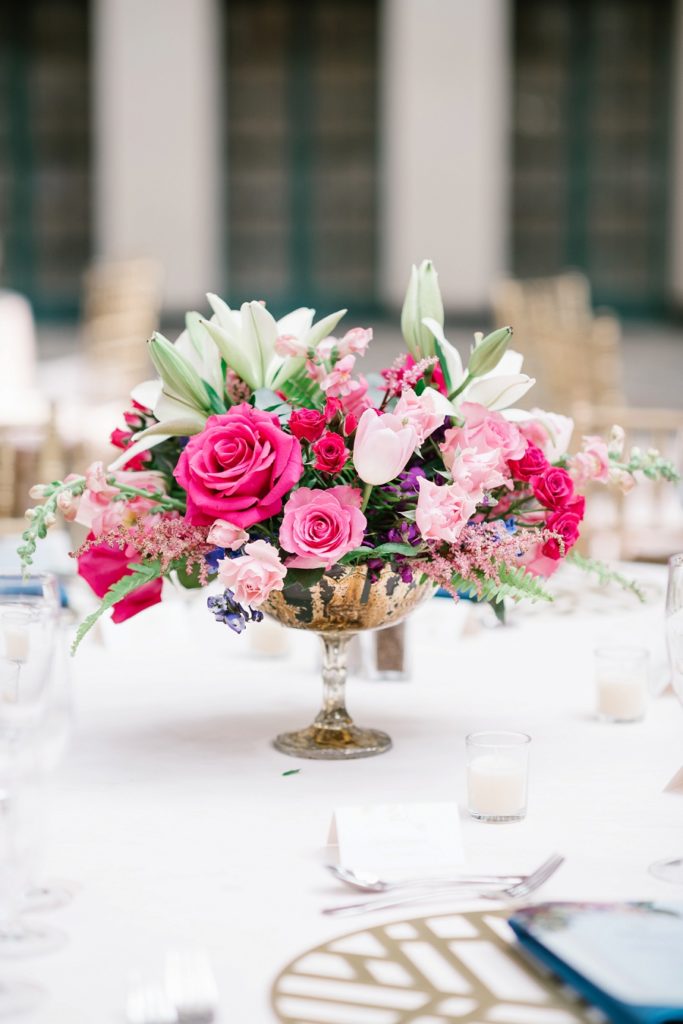 colorful floral centerpieces in vintage glass
