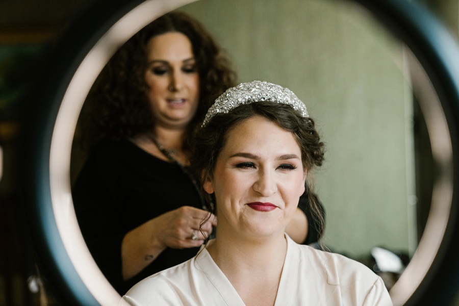 beautiful bride having her hair done