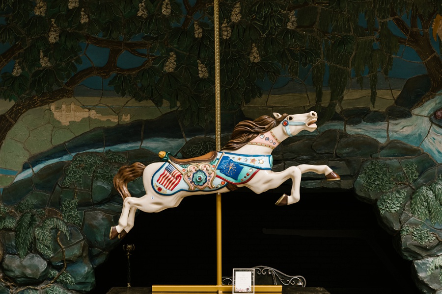 One of nearly a dozen full size carousel horses from Holiday World used as centerpieces of a wedding reception at the West Baden Springs Hotel