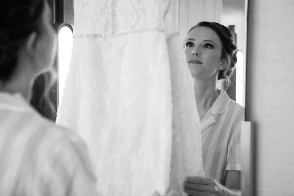 Indianapolis bride looking at her wedding gown