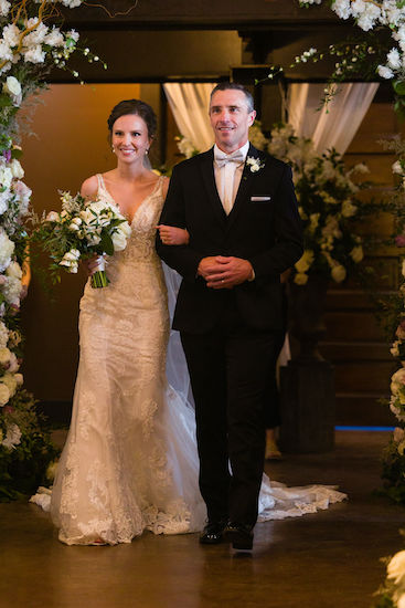 Indianapolis bride walking down the aisle with her father at Canal 337