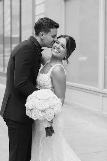 Bride3 and groom posing for photos in downtown Indianapolis