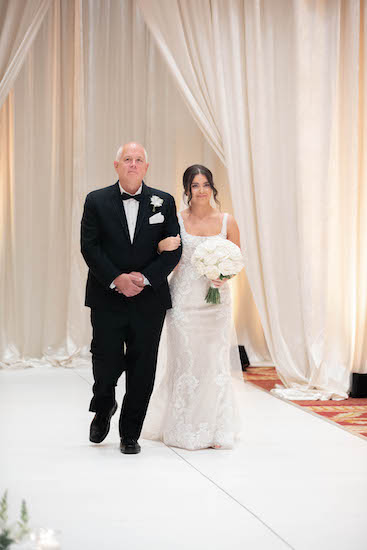 Bride walking down the aisle with her father