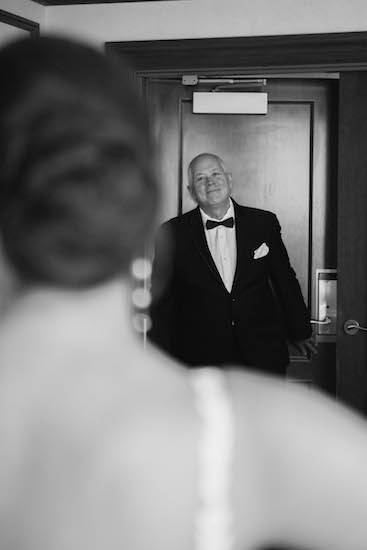 Father of the bride seeing his daughter for the first time