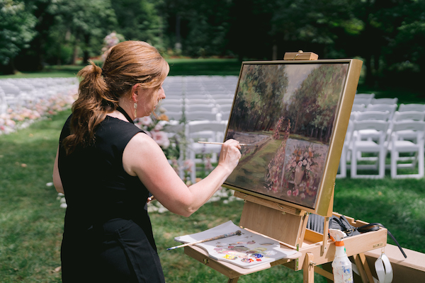 artist capturing beautiful Newfierlds wedding on canvas