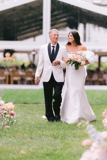 dad escorting his daughter down the aisle at newfields