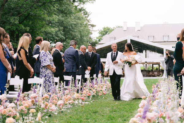 dad escorting his daughter down the aisle