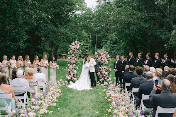 Indianapolis bride and groom sealing vows with a kiss