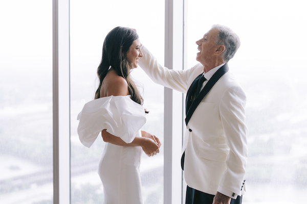 bride having her first look with her father