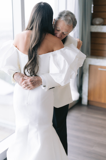 bride having her first look with her father