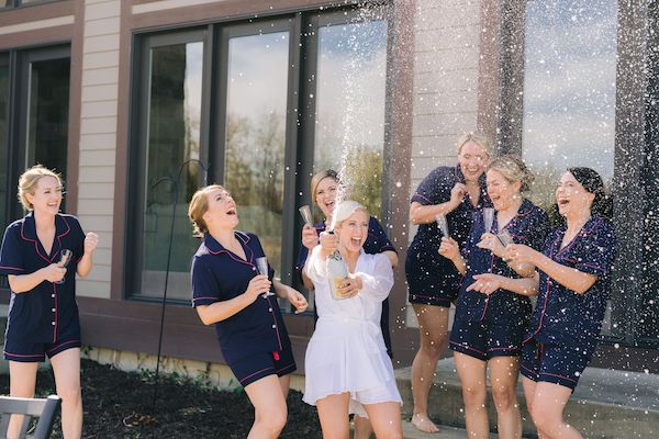 Indianapolis bride popping some bubbly