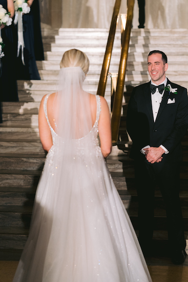 Indianapolis bride and groom seeing each other before their Central Library wedding