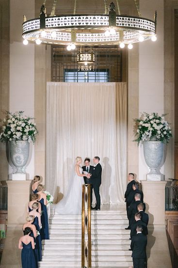 bride and groom exchanging vows on the steps of the Indianapolis Central Library