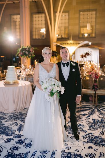 bride and groom after a sneak peek at their Central Library wedding reception