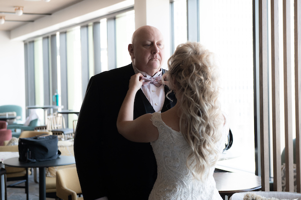 Indianapolis bride fixing her father's tie