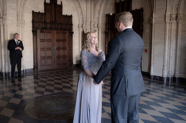 The mother of the groom seeing her son before his wedding at the Scottish Rite Cathedral