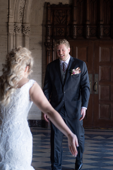 Indianapolis bride and groom's first look before their wedding at the Scottish Rite Cathedral