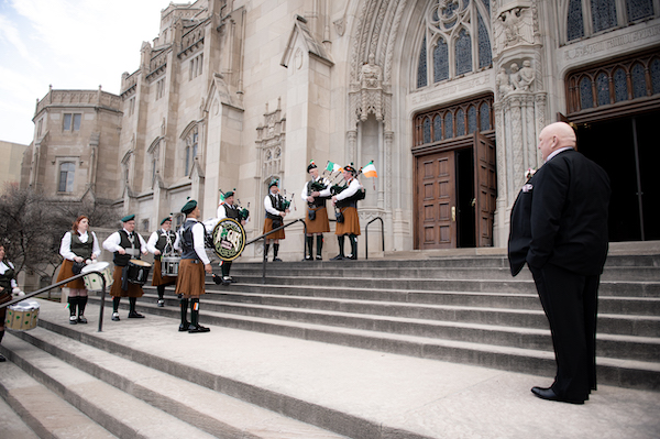 Father of the bride was surprised by an Irish Pipe and Drum Corp outside of the wedding ceremony