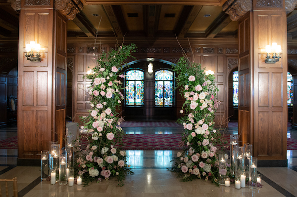 Pink and white floral ceremony structure