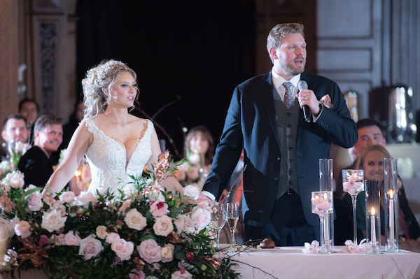 Bride and groom welcoming guests to their Indianapolis wedding reception