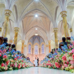 aisle at St. Mary's in Indianapolis lined with colorful flowers