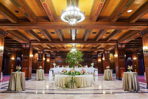 The lounge of the Scottish Rite Cathedral in Indianapolis set with a lush escort card table