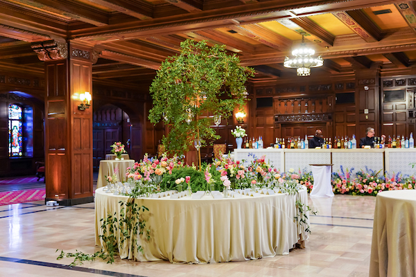 Escort card for a colorful wedding at the Scottish Rite Cathedral