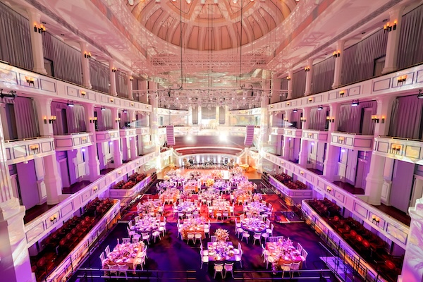 The concert hall at The Palladium in Carmel, Indiana, is set for a floral-themed wedding.