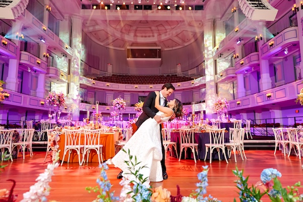 Newlyweds prating their first dance at the Palladium in Carmel Indiana
