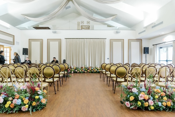 Wedding ceremony inside of Coxhall Mansion