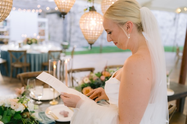 Bride and groom with Master Wedding Planner Monica Richard of Mon Amie Events, Inc. taking a sneak peek at their Wisconsin destination wedding decor.