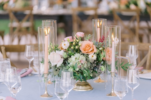 Beautiful wedding reception decor under a pole tent at Whispering Straits.