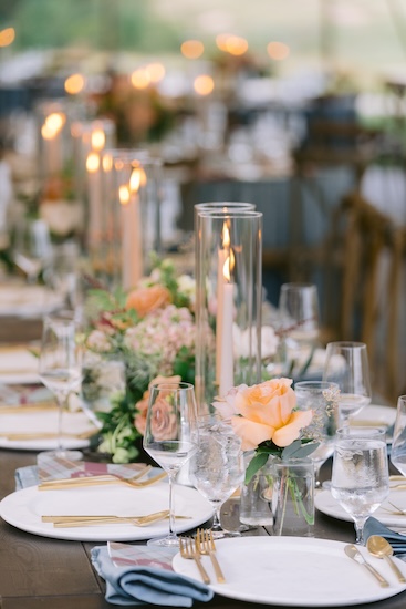 Beautiful wedding reception decor under a pole tent at Whispering Straits.