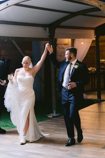 Bride and groom's entrance at their Whistling Straits wedding reception.