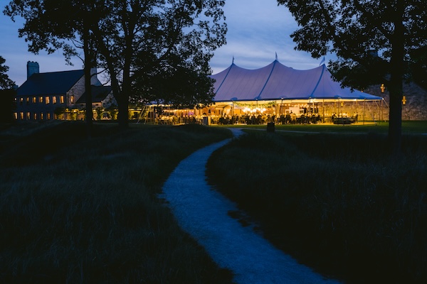 nighttime view of a Wisconsin destination wedding reception at Whistling Straits.